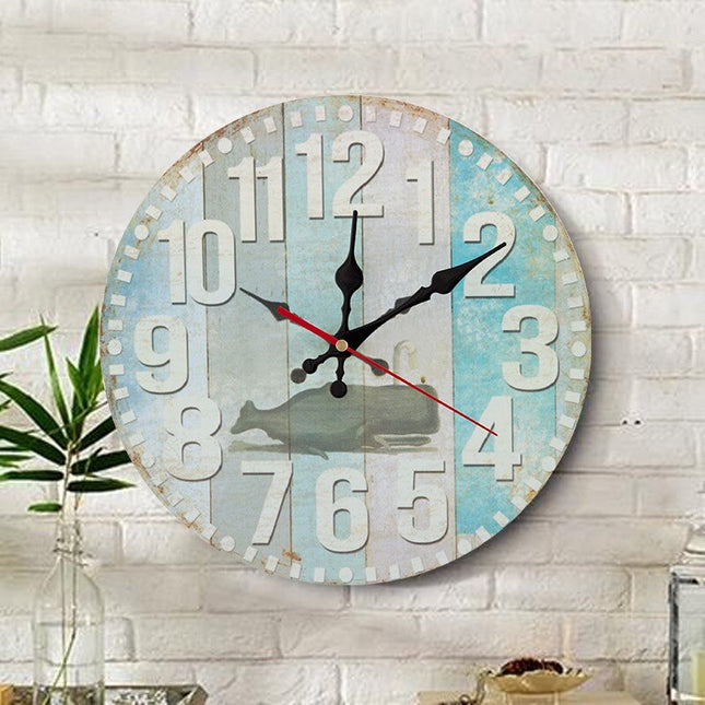 Dekorativ väggklocka i trä med ugglor