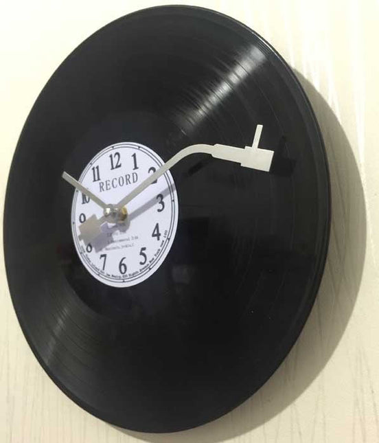 Retro vinylklocka med skivspelare design