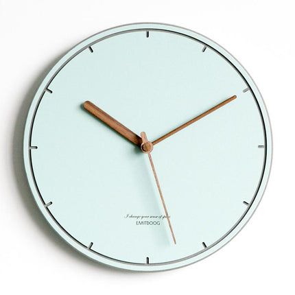 Minimalistisk väggklocka i pastell skandinavisk design