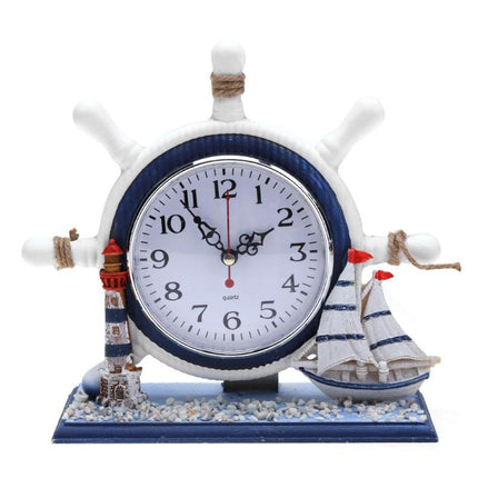 Maritim bordsklocka med fyr och roder