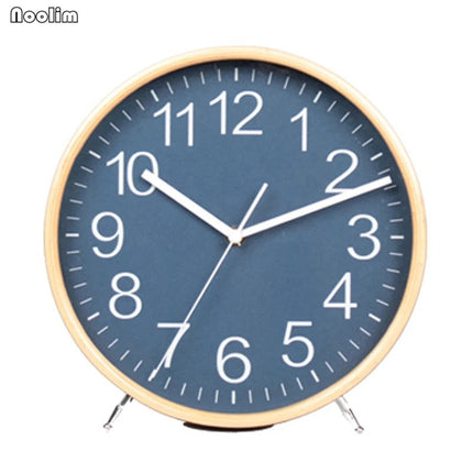 Rund bordsklocka i trä för sängbord