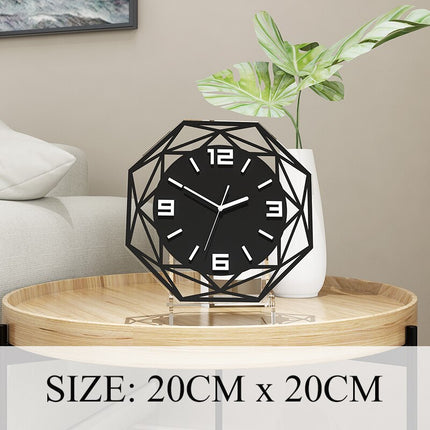 Geometrisk bordsklocka i svart metall