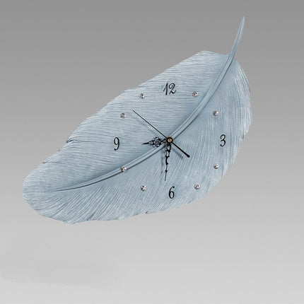 Väggklocka i Form av en Fjäder