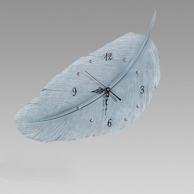 Väggklocka i Form av en Fjäder