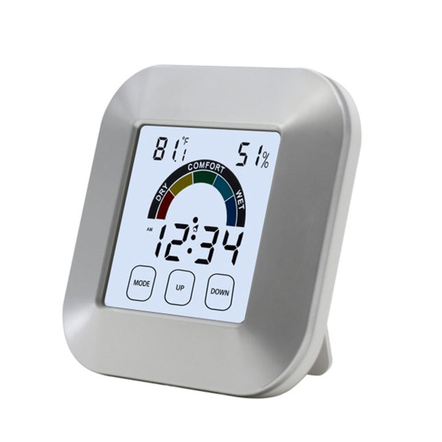 Digital bordsklocka med fuktighetsmätare