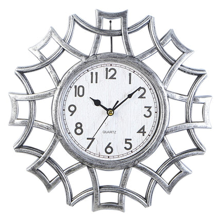 Stor dekorativ väggklocka med ram