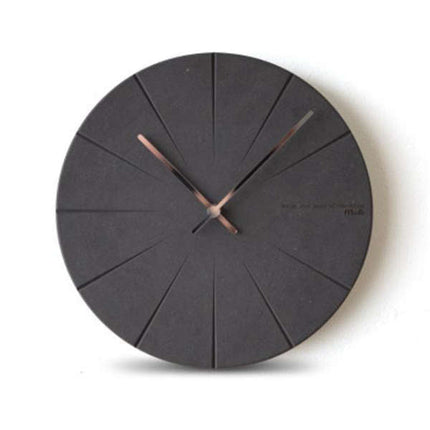 Svart minimalistisk väggklocka utan siffror