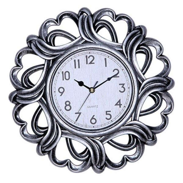 Dekorativ väggklocka i mörkt trä