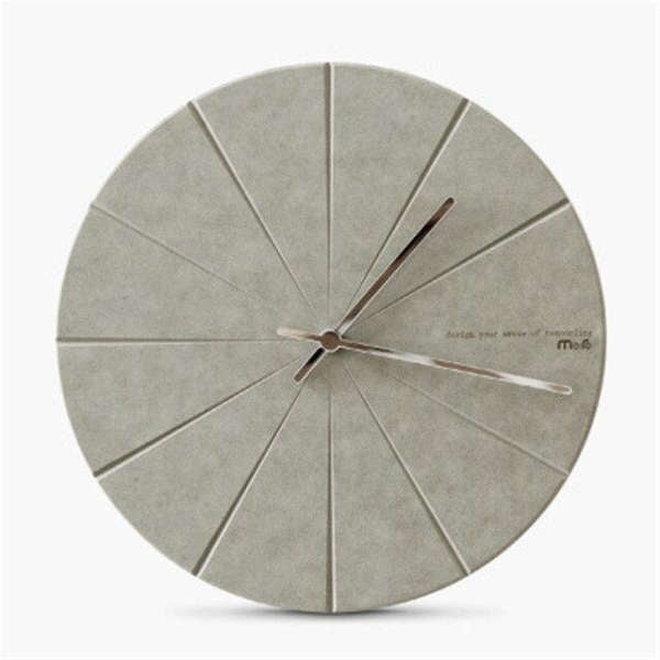 Svart minimalistisk väggklocka utan siffror