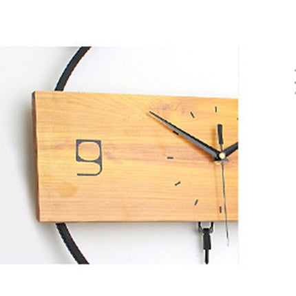 Minimalistisk väggklocka i trä med fåglar