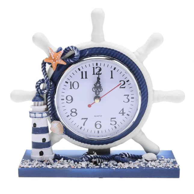 Maritim bordsklocka med fyr och roder