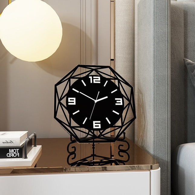 Geometrisk bordsklocka i svart metall