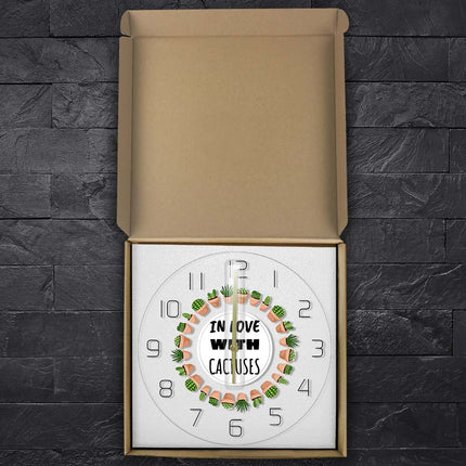 Modern LED väggklocka med kaktusar