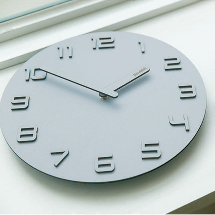 Minimalistisk väggklocka med 3D-siffror