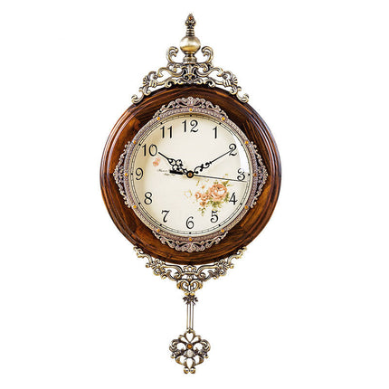 Antik väggklocka i trä och metall