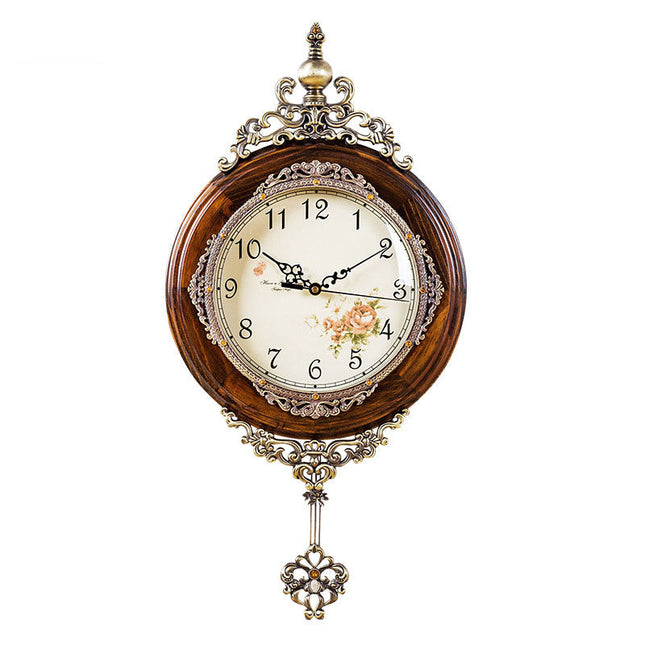 Antik väggklocka i trä och metall