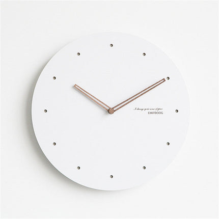 Tyst minimalistisk väggklocka i vitt