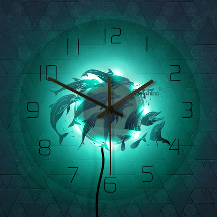 LED väggklocka med hoppande delfiner