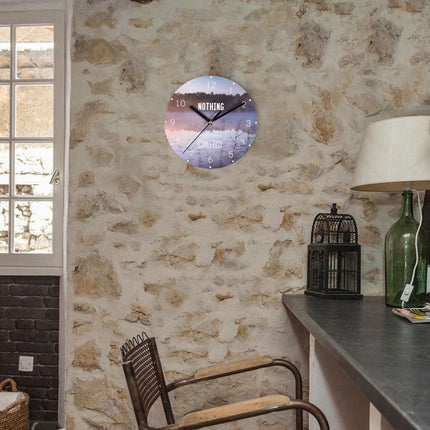 Modern väggklocka med inspirerande citat