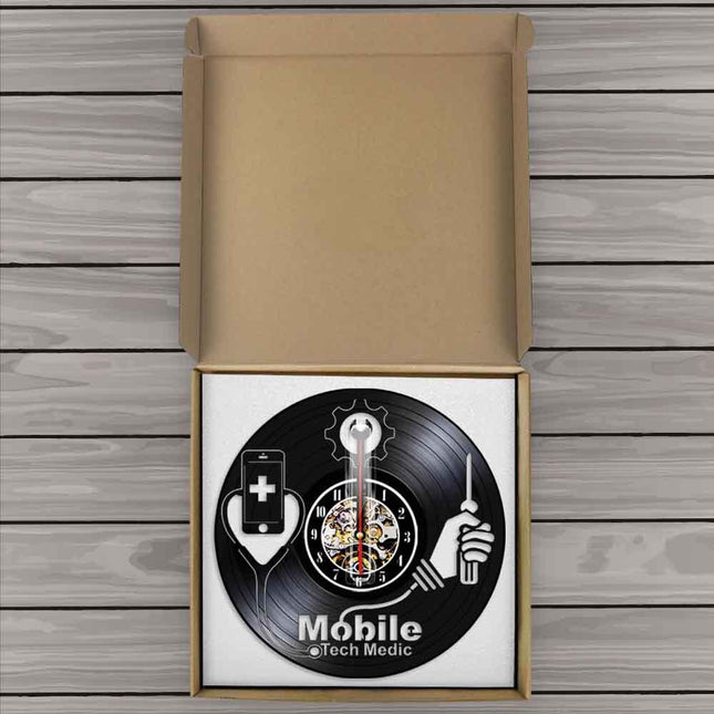 Vinylklocka med medicin och teknik motiv