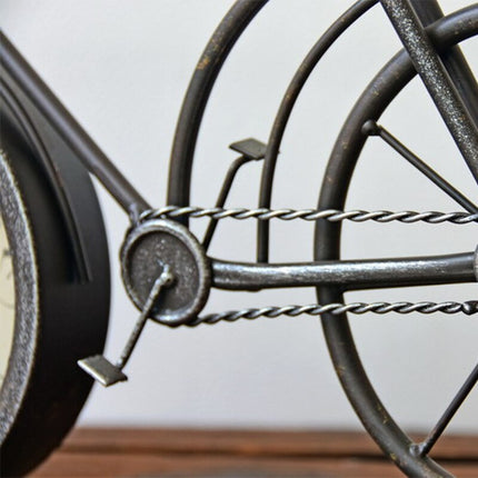 Bordsklocka formad som en retrocykel