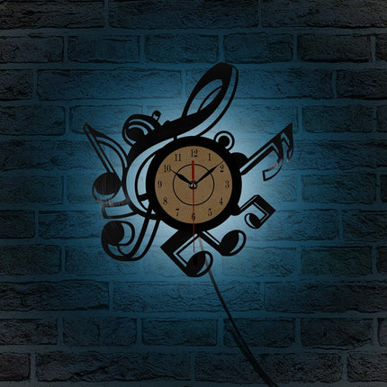 Väggklocka i vinyl med musiknoter