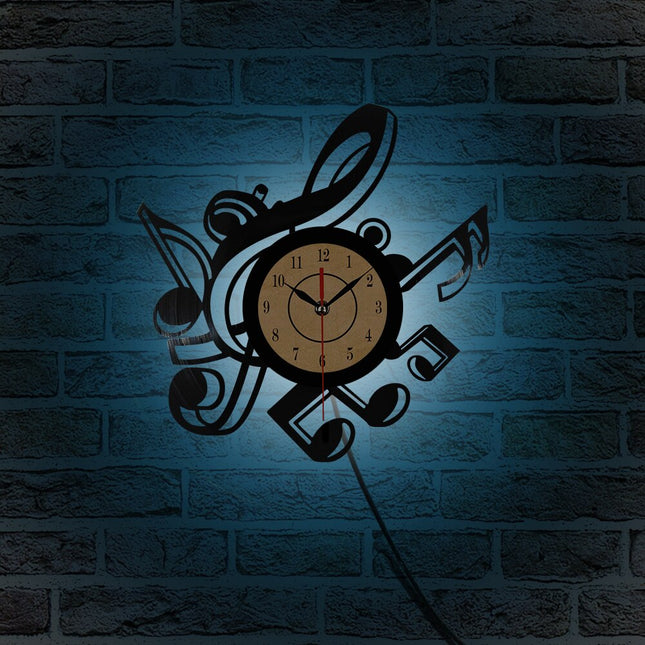 Väggklocka i vinyl med musiknoter