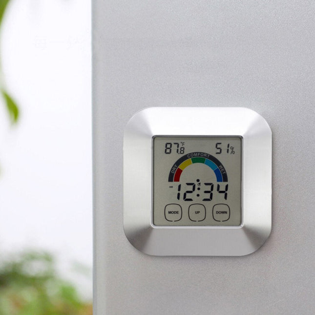 Digital bordsklocka med fuktighetsmätare