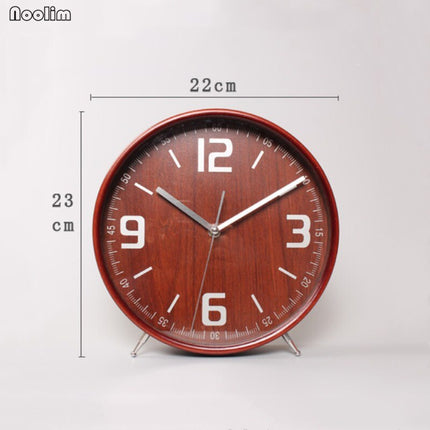 Rund bordsklocka i trä för sängbord