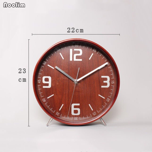 Rund bordsklocka i trä för sängbord