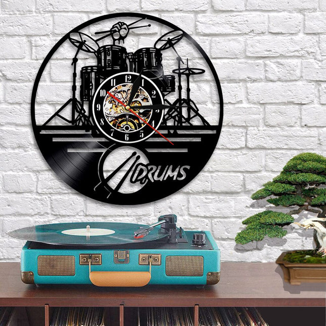 Vinyl väggklocka med trumset motiv