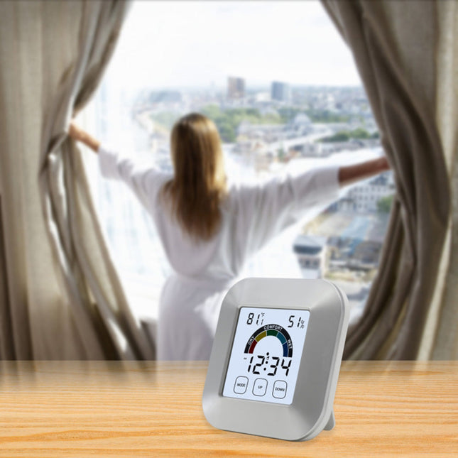 Digital bordsklocka med fuktighetsmätare