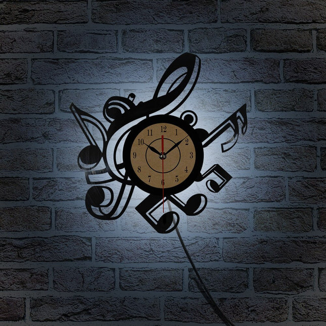 Väggklocka i vinyl med musiknoter