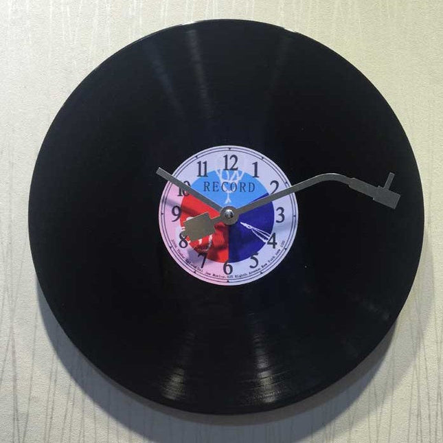 Retro vinylklocka med skivspelare design