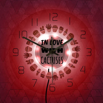 Modern LED väggklocka med kaktusar