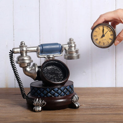 Retro bordsklocka i form av telefon