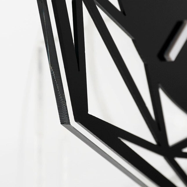 Geometrisk bordsklocka i svart metall