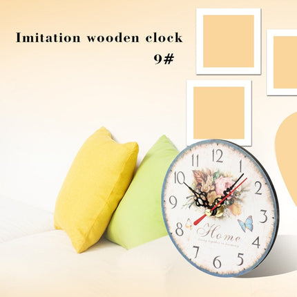 Vintage väggklocka i trä med blommor