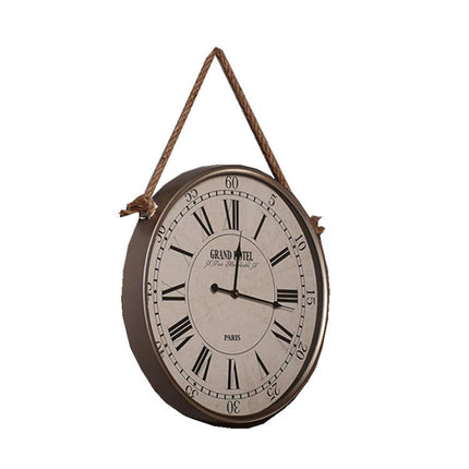 Hängande väggklocka med rep Grand Hotel