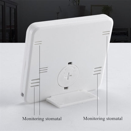 Vit digital bordsklocka med termometer