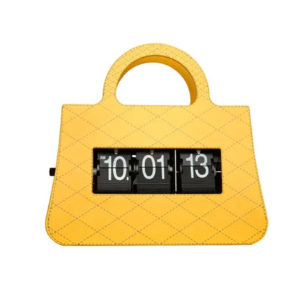 Flip-klocka designad som en handväska
