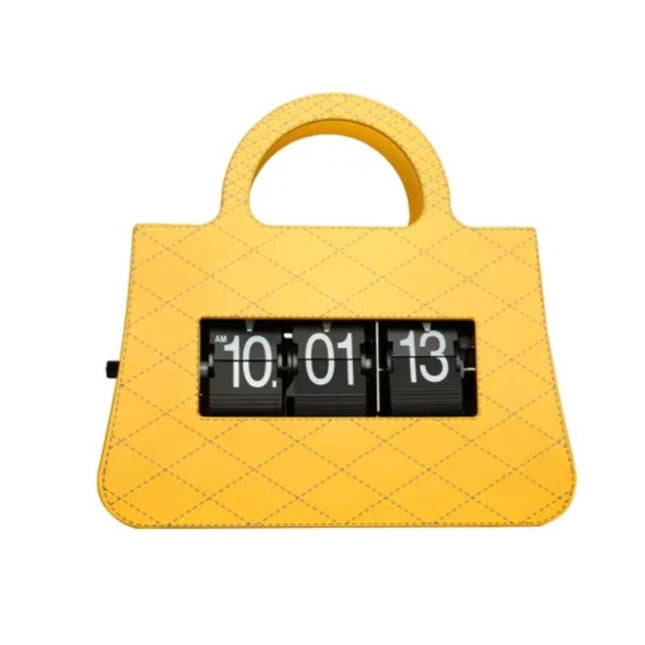 Flip-klocka designad som en handväska