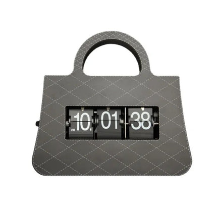 Flip-klocka designad som en handväska