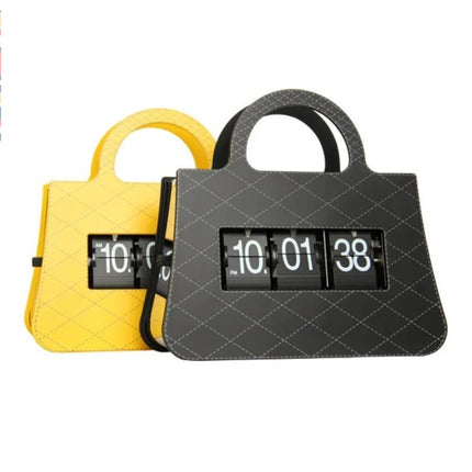 Flip-klocka designad som en handväska