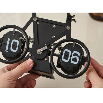Retro flip-klocka designad som cykel