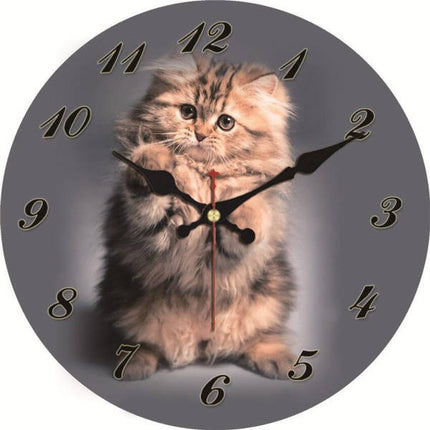 Rund väggklocka med motiv av kattunge